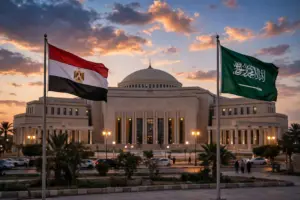 Egypt's parliament building in Cairo with the flags of Egypt and Saudi Arabia flying side by side