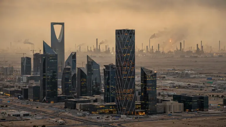 Riyadh financial district skyscrapers at dusk amid IMF's forecast of a 3.3% Saudi economic contraction