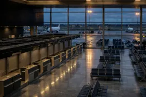 Nearly empty departure hall at Riyadh's King Khalid International Airport after mass flight cancellations