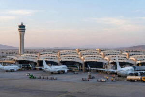 Passenger jets parked at gates at King Khalid International Airport in Riyadh as flights resume after a two-week closure